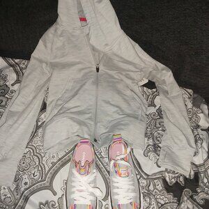 Brand new Casual canvas shoes with a light zip up hoodie.